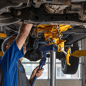 Autosmith technician servicing transmission